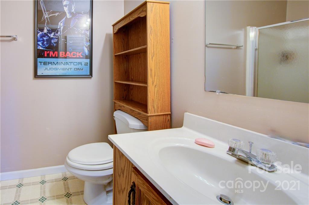 262 Spring Run Road Mooresville, NC 28117 - Photo 33 of 42 a bathroom with a sink a toilet and shower