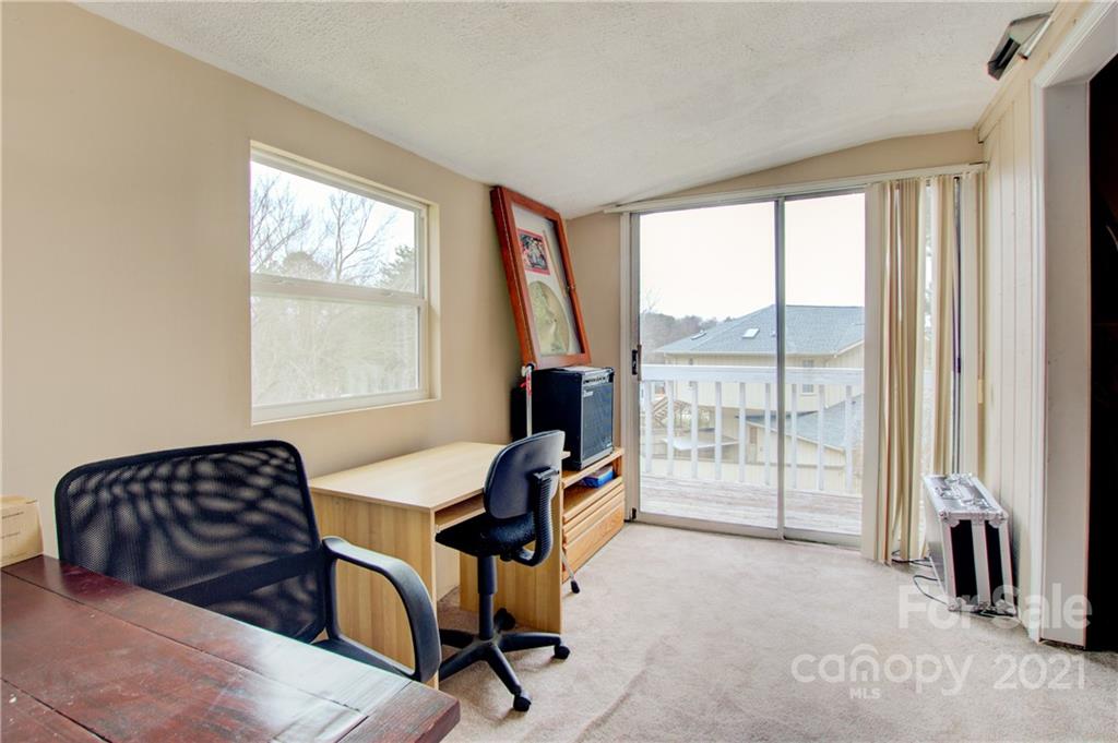 262 Spring Run Road Mooresville, NC 28117 - Photo 36 of 42 a view of a livingroom with workspace and a window