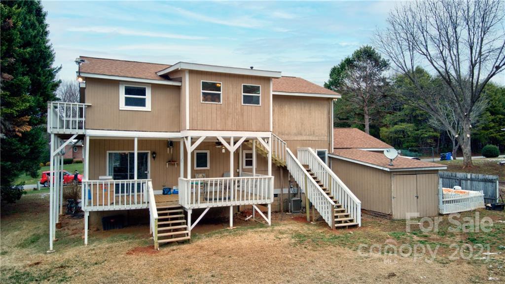 262 Spring Run Road Mooresville, NC 28117 - Photo 38 of 42 a view of a house with a yard and deck