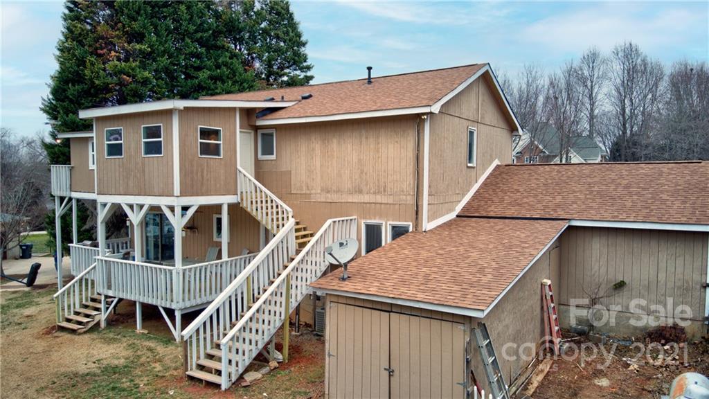 262 Spring Run Road Mooresville, NC 28117 - Photo 39 of 42 a view of house with backyard and deck