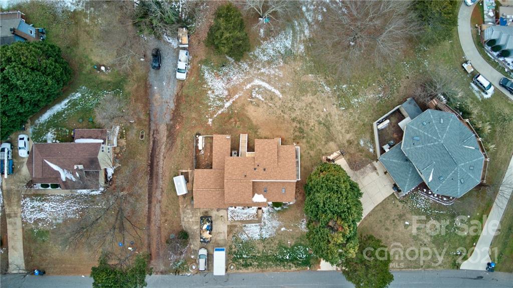262 Spring Run Road Mooresville, NC 28117 - Photo 40 of 42 an aerial view of houses with outdoor space