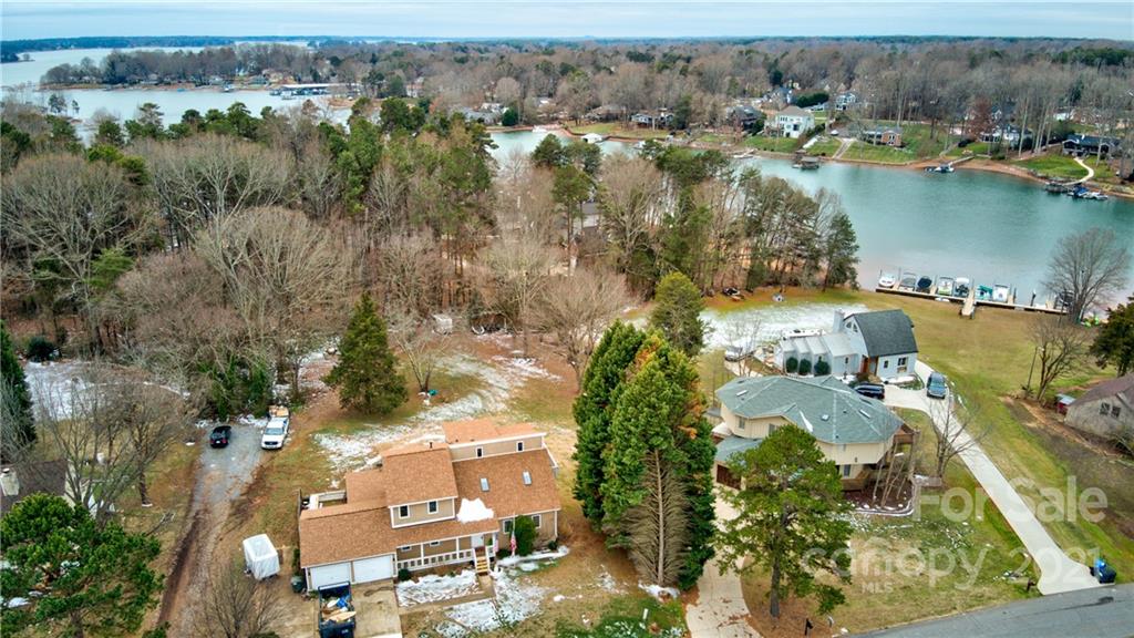 262 Spring Run Road Mooresville, NC 28117 - Photo 4 of 42 an aerial view of a house with a lake view