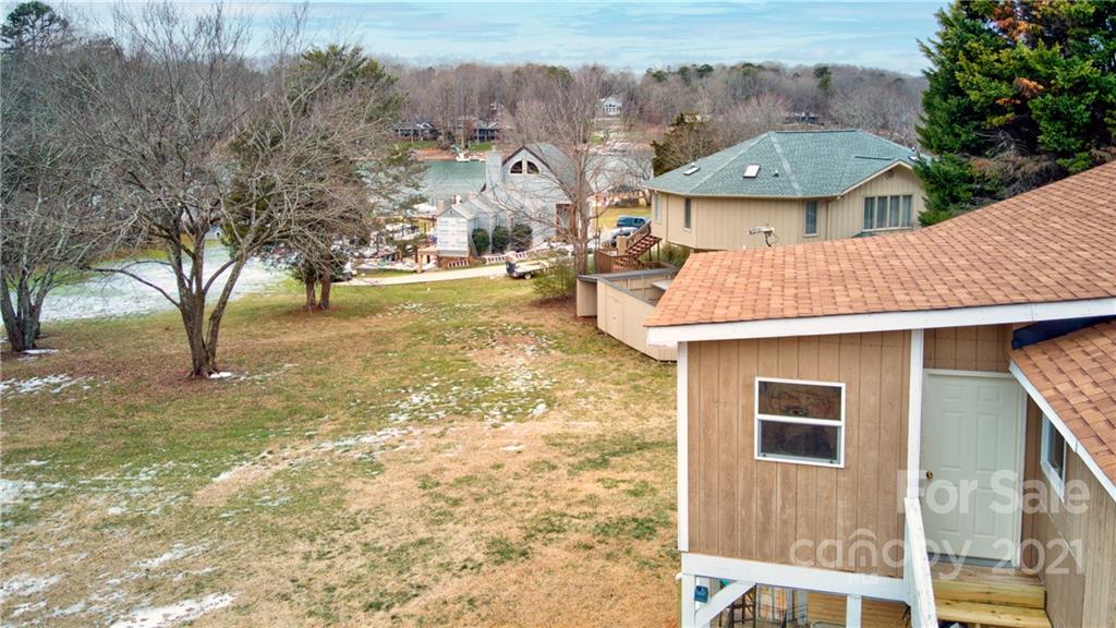 262 Spring Run Road Mooresville, NC 28117 - Photo 5 of 42 a view of a house with a yard and sitting area