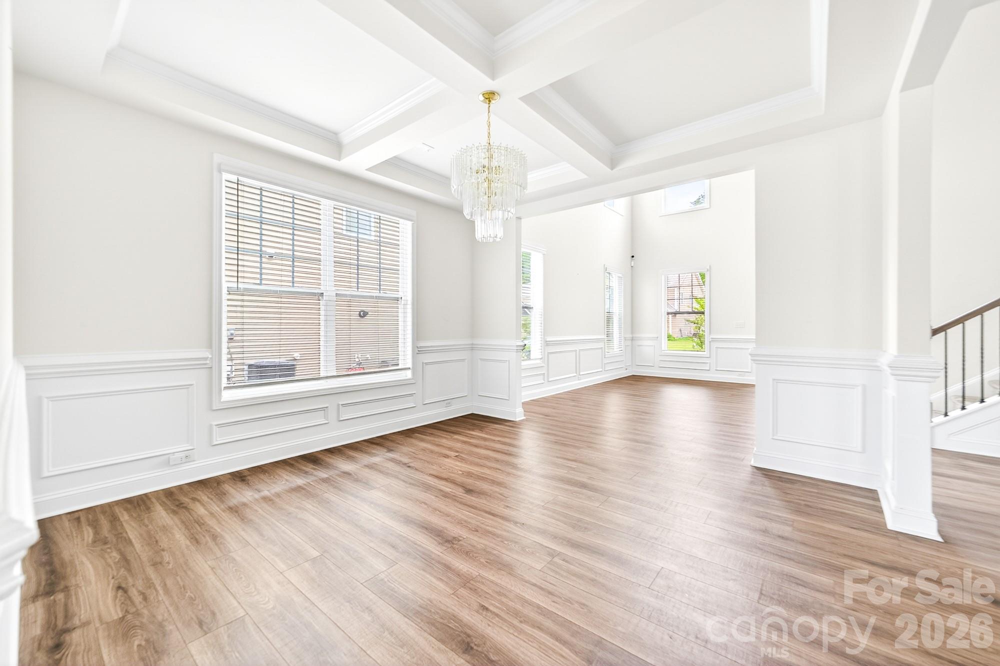 5972 Redwood Pine Road Concord, NC 28027 - Photo 9 of 37 wooden floor in an empty room with a window