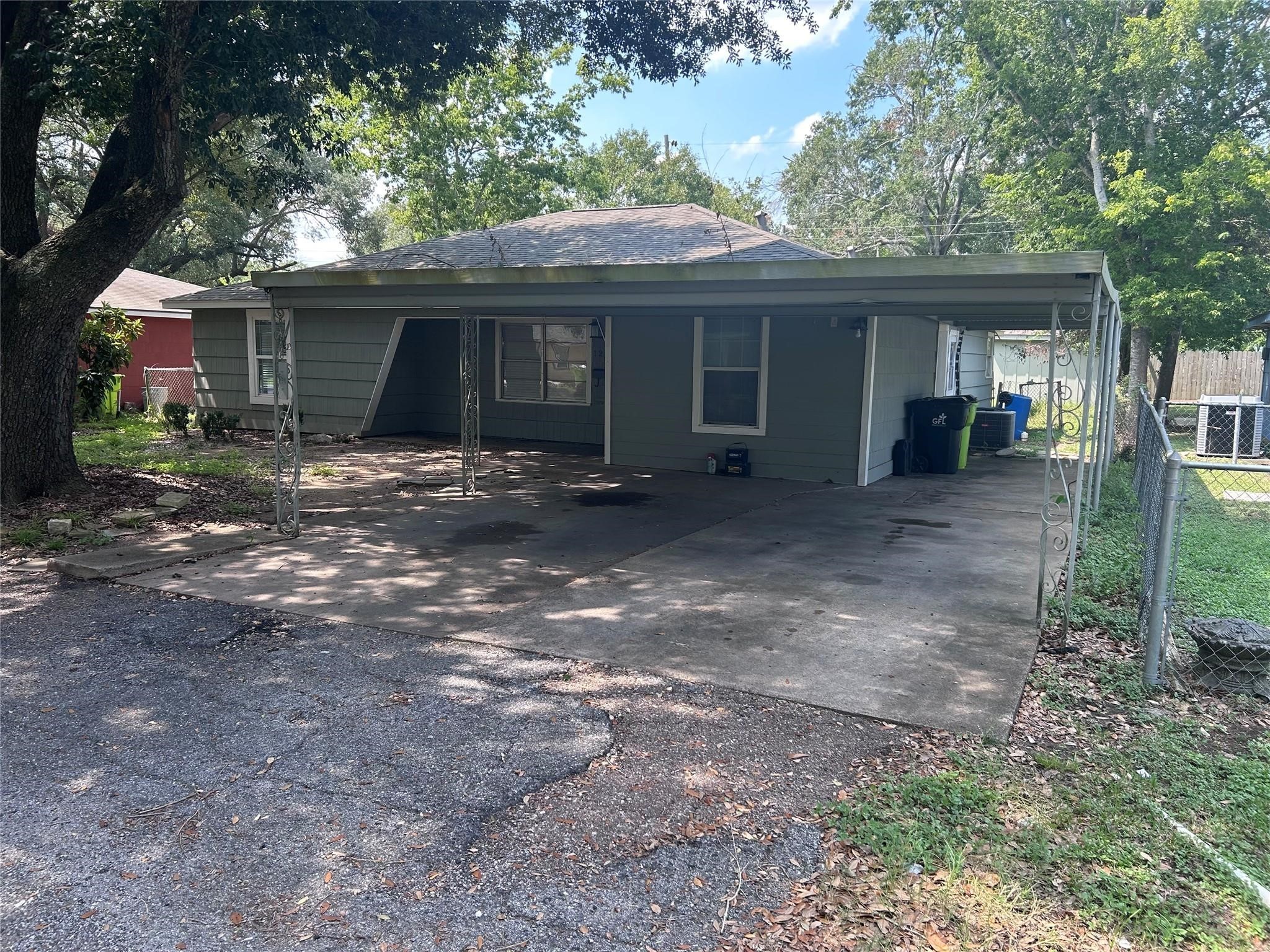 1212 Alamo Street Rosenberg, TX 77471 - Photo 2 of 34 a view of a house with a yard