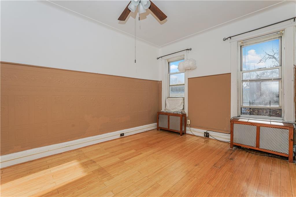 464 73rd Street Brooklyn, NY 11209 - Photo 7 of 37 a view of an empty room with a window
