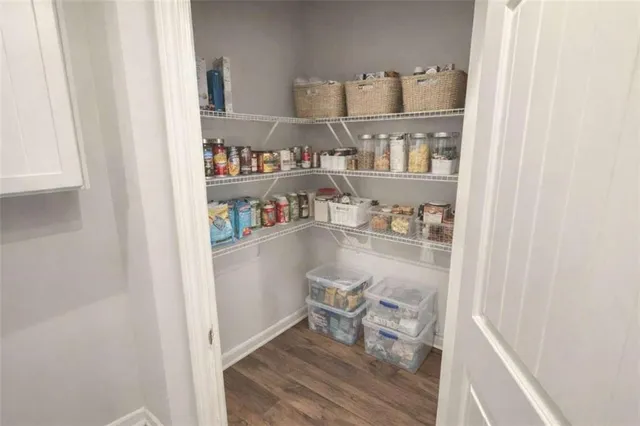 a room with table and chairs