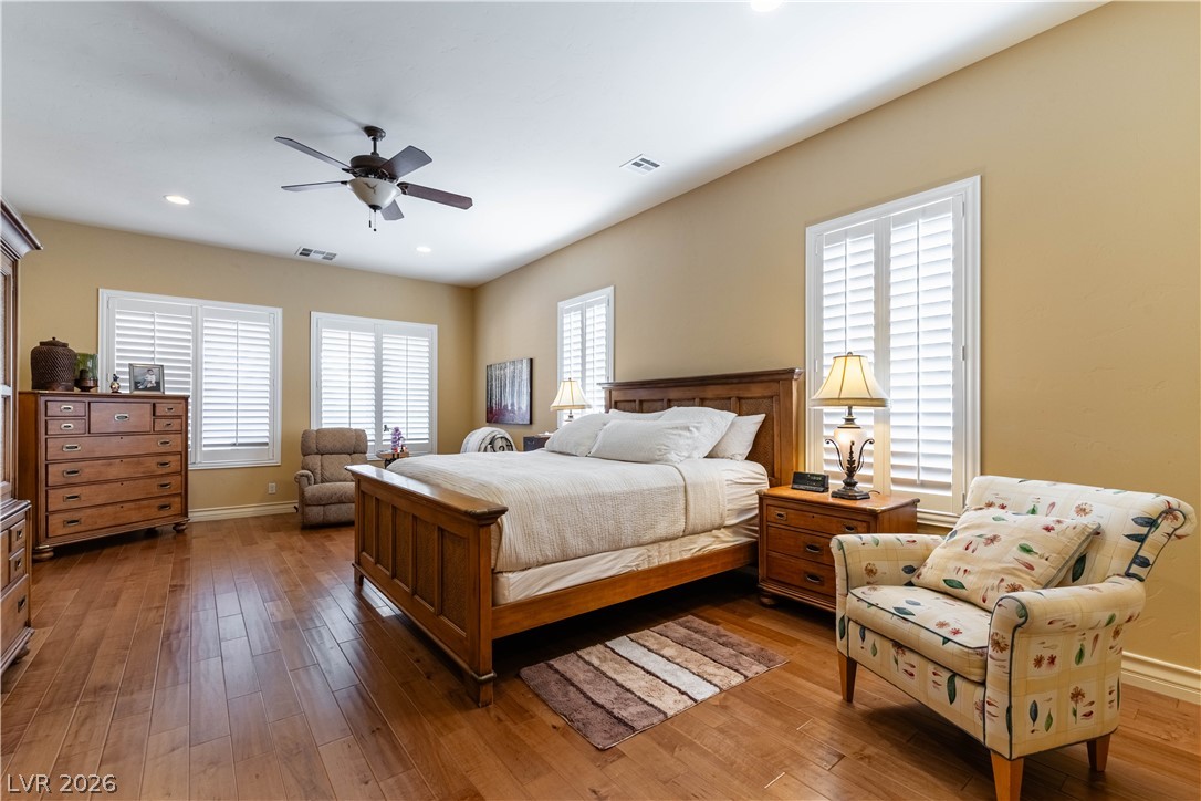 3661 Riley Ann Avenue Las Vegas, NV 89139 - Photo 29 of 42 A restful retreat with lustrous hardwood floors and well-lit with recessed lighting and natural light from shuttered windows.
