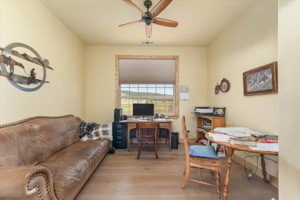a view of a house with swimming pool and porch with furniture