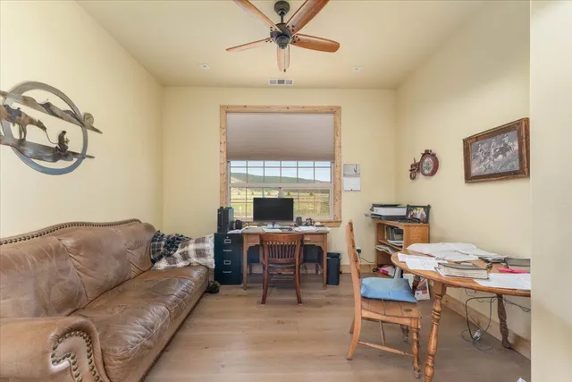 a view of a house with swimming pool and porch with furniture