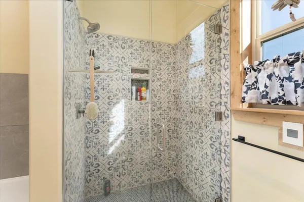 a view of an ocean and mountain