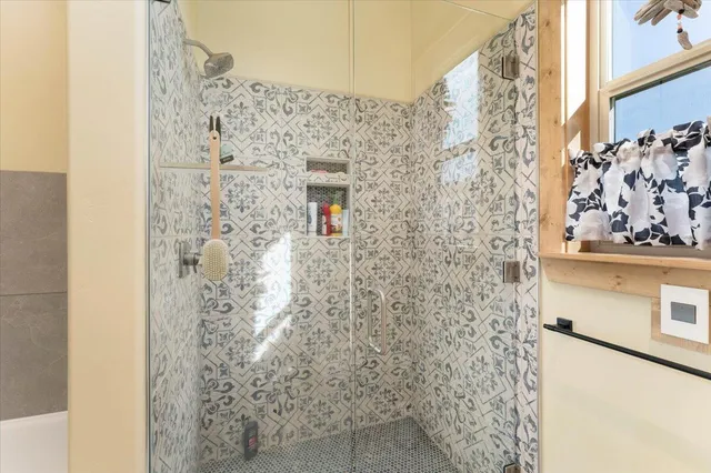 a view of an ocean and mountain