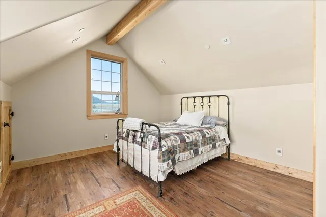 a view of an ocean and a mountain