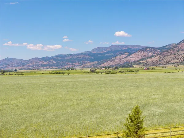 a view of a water fountain and an ocean view