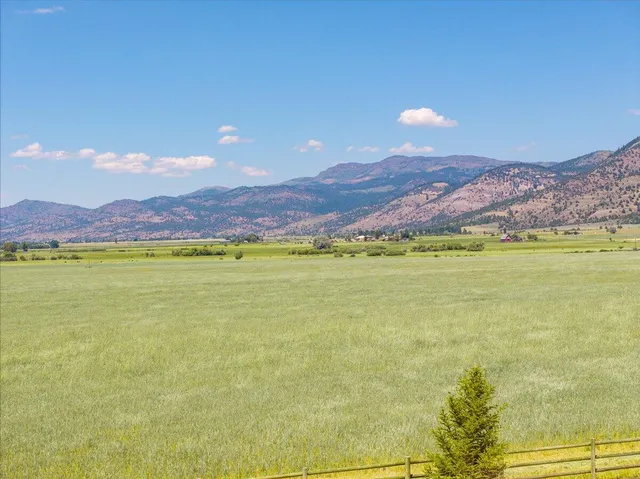a view of a water fountain and an ocean view