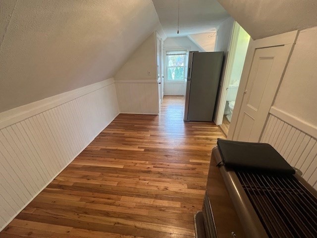24 Circuit Street, Unit 3 New Bedford, MA 02740 - Photo 1 of 6 a view of a hallway with wooden floor and staircase