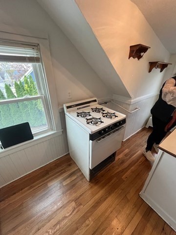 24 Circuit Street, Unit 3 New Bedford, MA 02740 - Photo 3 of 6 a white stove top oven sitting inside of a kitchen