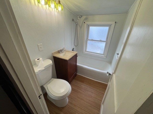 24 Circuit Street, Unit 3 New Bedford, MA 02740 - Photo 4 of 6 a white toilet sitting next to a bathroom sink
