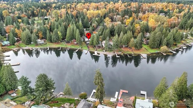 a view of swimming pool with seating area