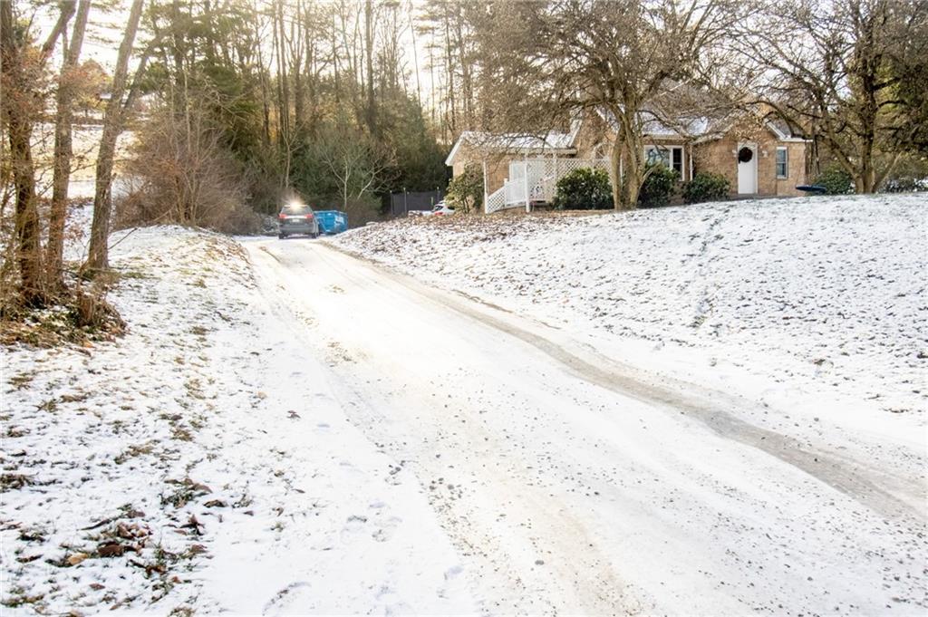 125 Slate Run Road Greensburg, PA 15601 - Photo 30 of 37 a street view covered with snow