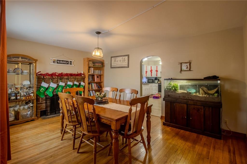 125 Slate Run Road Greensburg, PA 15601 - Photo 3 of 37 a view of a dining room with furniture and wooden floor