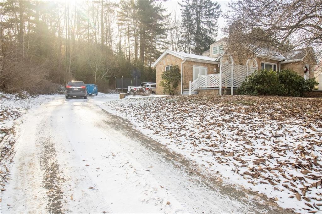 125 Slate Run Road Greensburg, PA 15601 - Photo 31 of 37 a view of a backyard with a tree