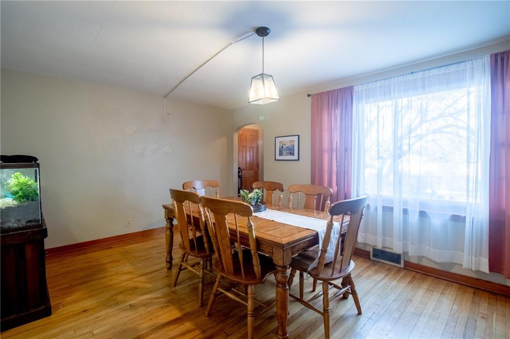125 Slate Run Road Greensburg, PA 15601 - Photo 5 of 37 a view of a dining room with furniture window and wooden floor