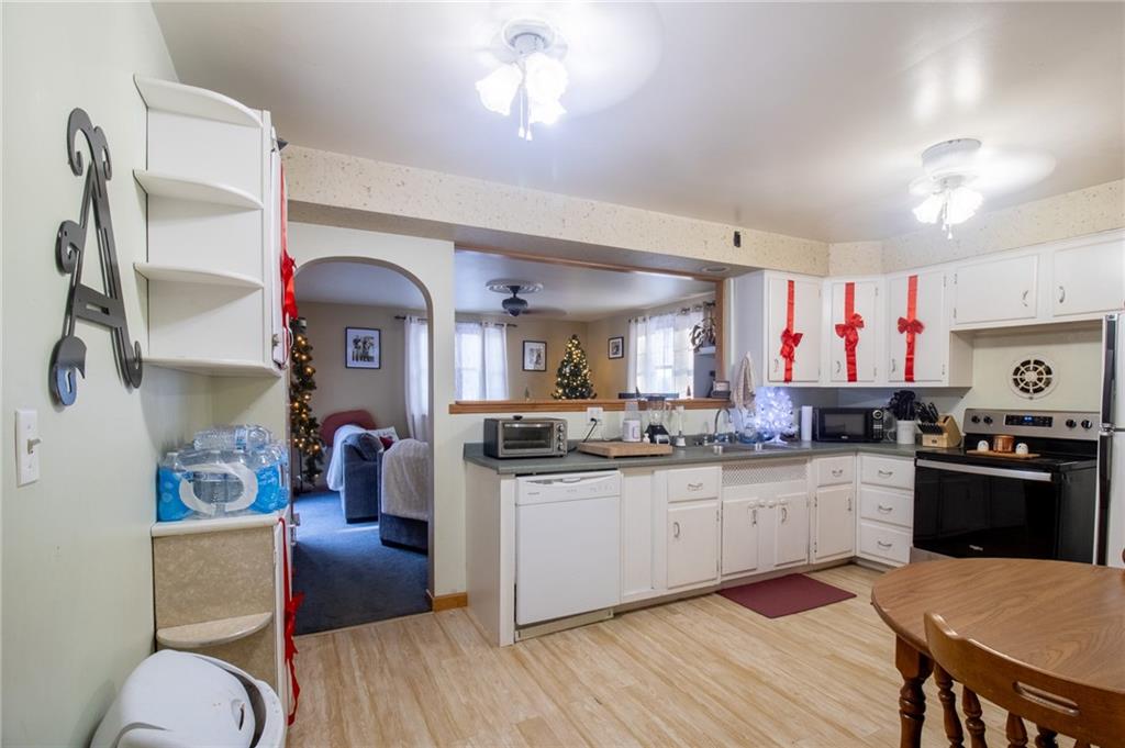 125 Slate Run Road Greensburg, PA 15601 - Photo 6 of 37 a kitchen with lots of counter top space and wooden floor