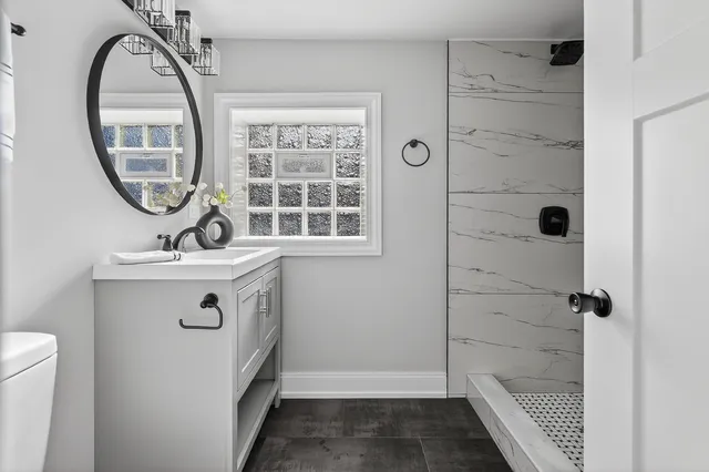 a view of room with wooden floor and window