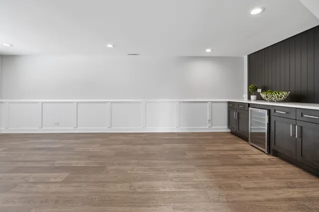 a view of a house with a snow on the road