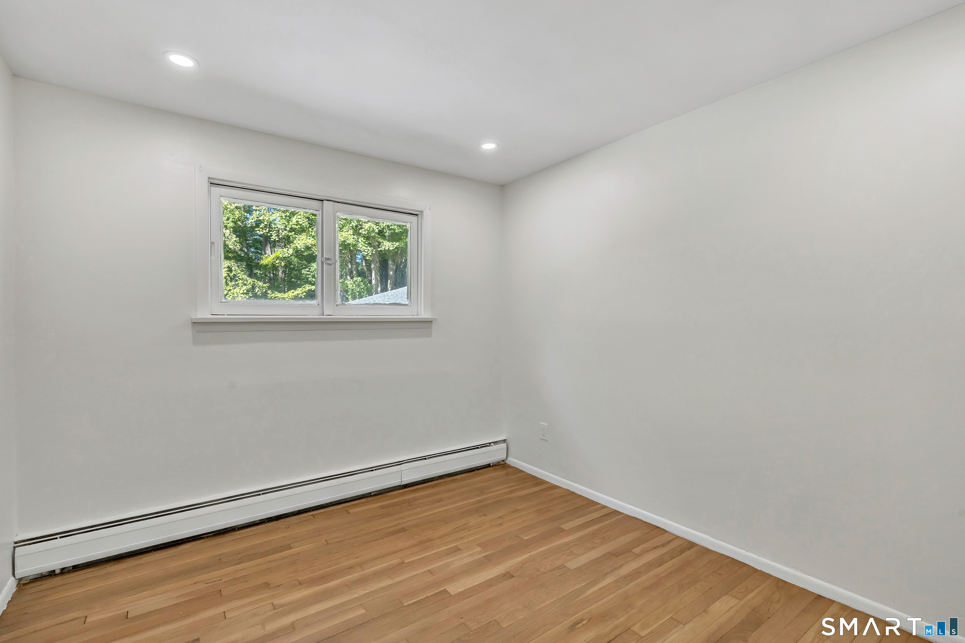 48 Crestwood Road Monroe, CT 06468 - Photo 27 of 32 an empty room with a window