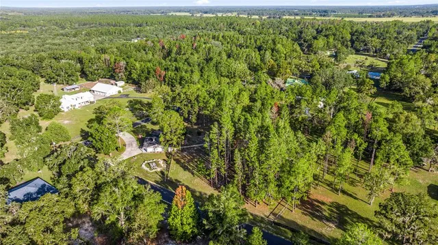 a view of a yard with an outdoor space