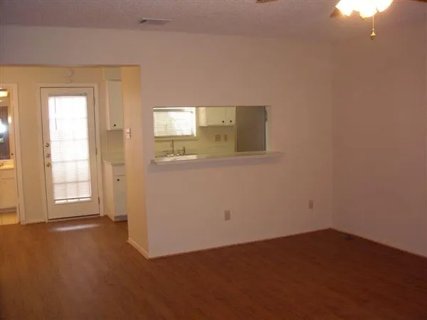 a kitchen with a refrigerator sink and stove
