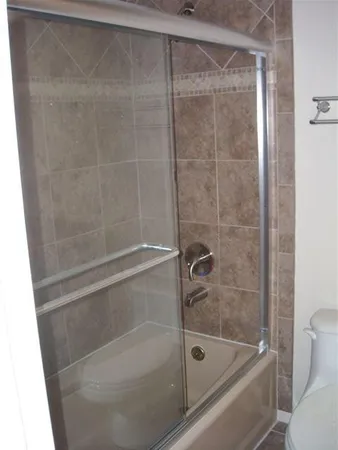 a bathroom with a sink toilet and vanity