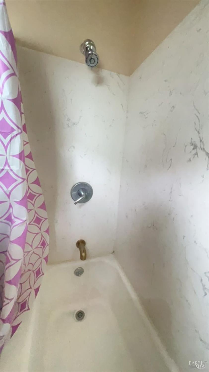 1020 Bennett Valley Road Santa Rosa, CA 95404 - Photo 18 of 24 a bathroom with a sink