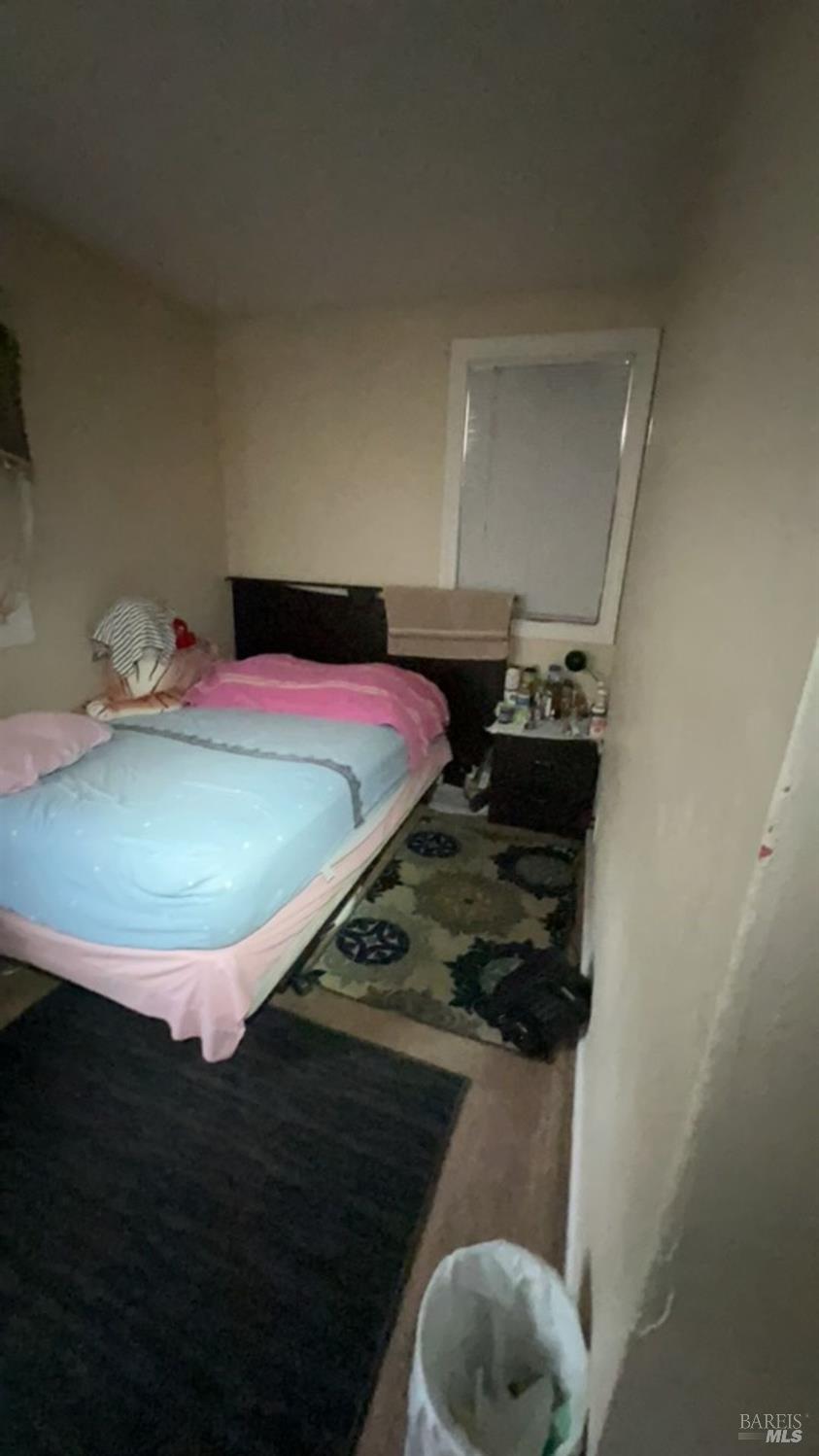 1020 Bennett Valley Road Santa Rosa, CA 95404 - Photo 21 of 24 a kitchen with a stove and a refrigerator