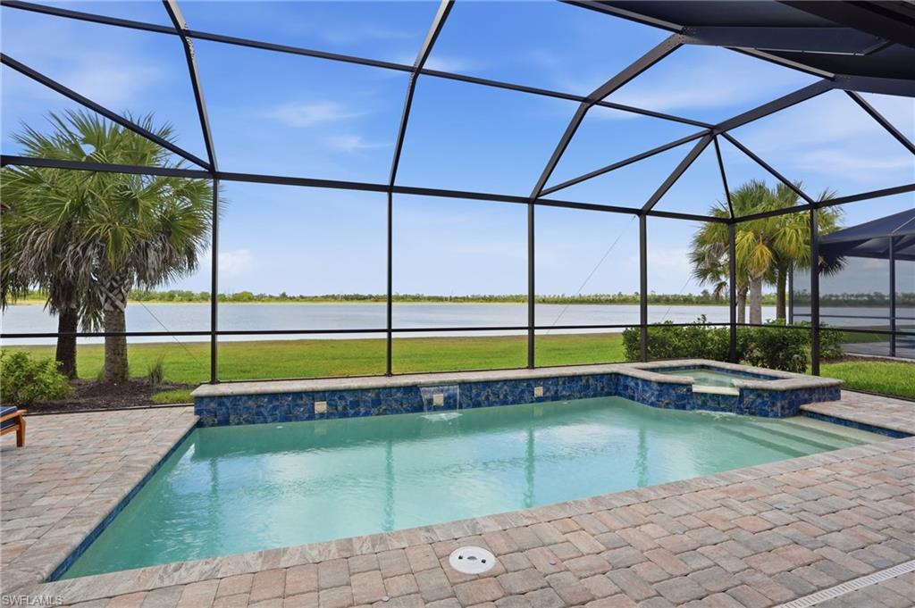 19696 Aqua View Lane Fort Myers, FL 33913 - Photo 33 of 50 a view of a swimming pool with a back yard