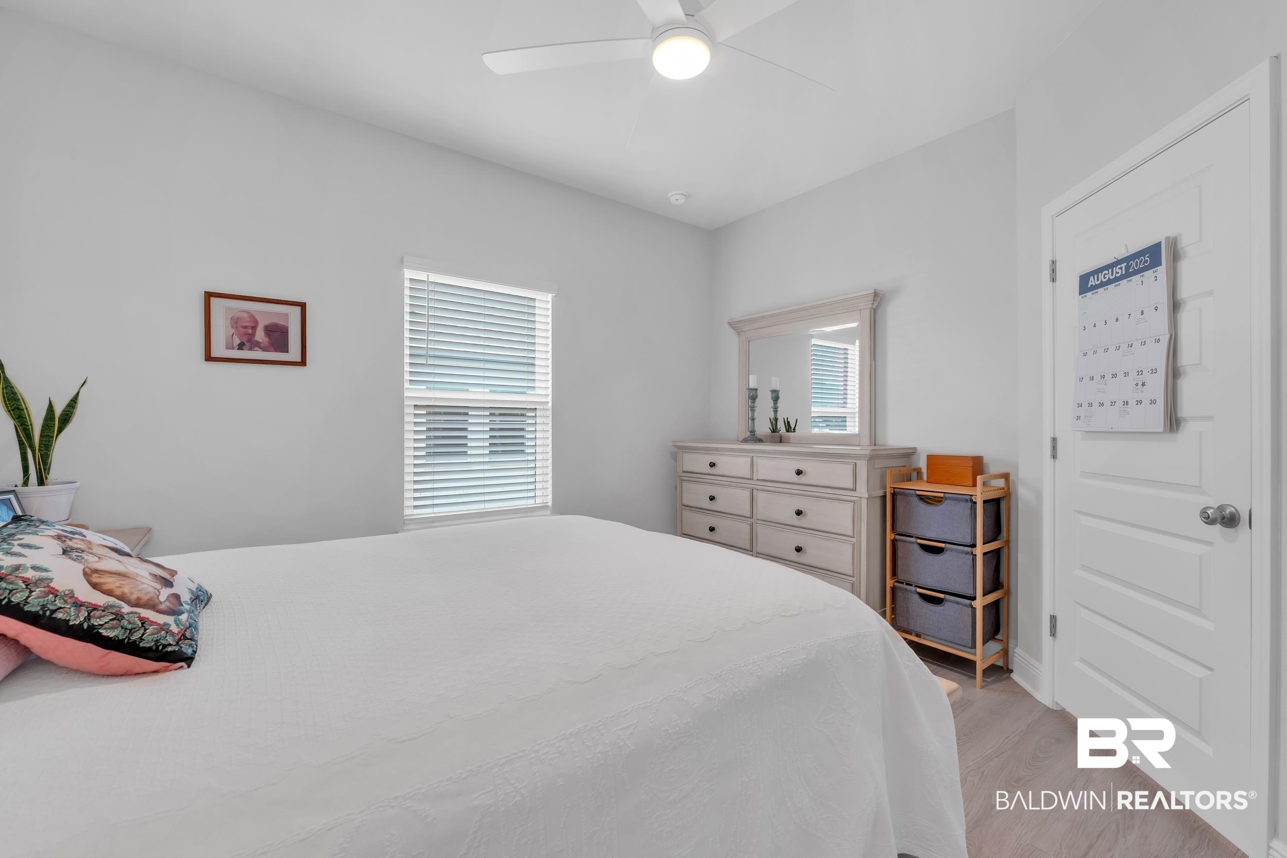 8774 Primland Boulevard Foley, AL 36535 - Photo 30 of 49 Bedroom with ceiling fan and light wood finished floors