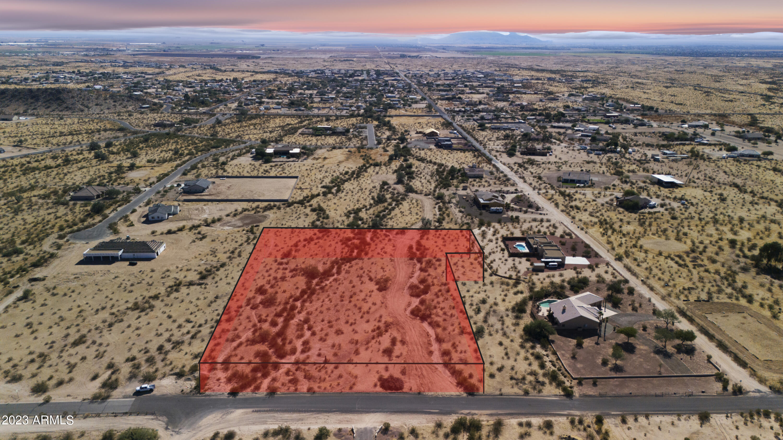 1 West Martin Road Casa Grande, AZ 85194 - Photo 2 of 11 an aerial view of residential houses with outdoor space