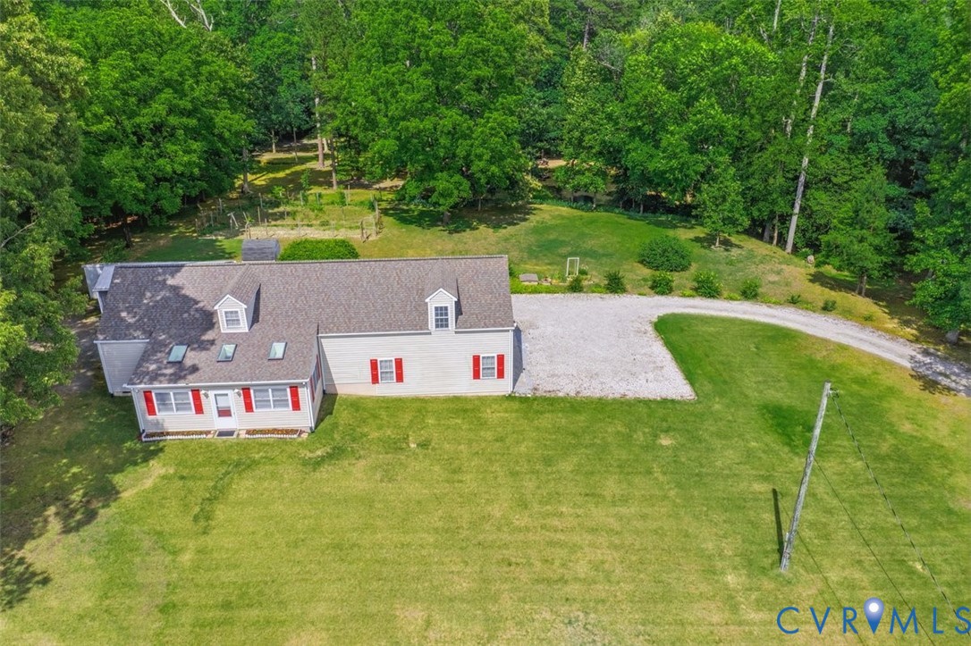 18501 Branders Bridge Road Colonial Heights, VA 23834 - Photo 4 of 43 an aerial view of a house with a garden and swimming pool
