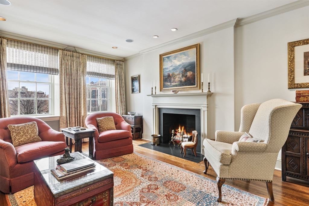 81 Beacon Street, Unit 8 Boston, MA 02108 - Photo 12 of 32 a living room with furniture and a fireplace