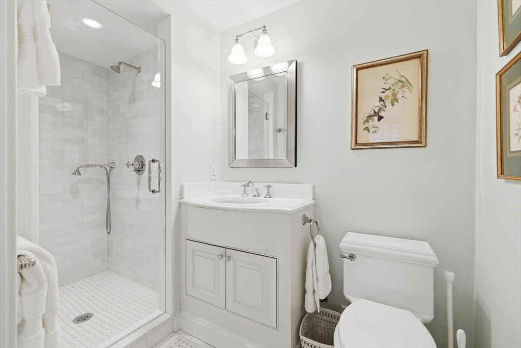 81 Beacon Street, Unit 8 Boston, MA 02108 - Photo 23 of 32 a bathroom with a toilet sink and shower