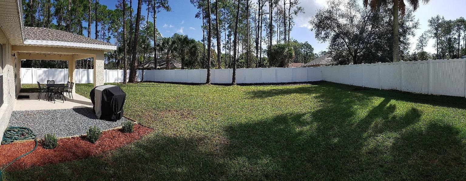 99 Rickenbacker Drive Palm Coast, FL 32164 - Photo 6 of 7 a view of backyard with green space