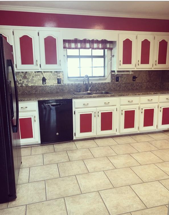 1607 Cairo Road Gallatin, TN 37066 - Photo 11 of 30 a view of a kitchen with stainless steel appliances granite countertop a stove a sink and a microwave