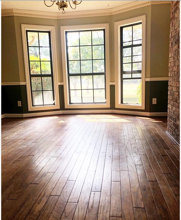 1607 Cairo Road Gallatin, TN 37066 - Photo 18 of 30 a view of an empty room with wooden floor and a window