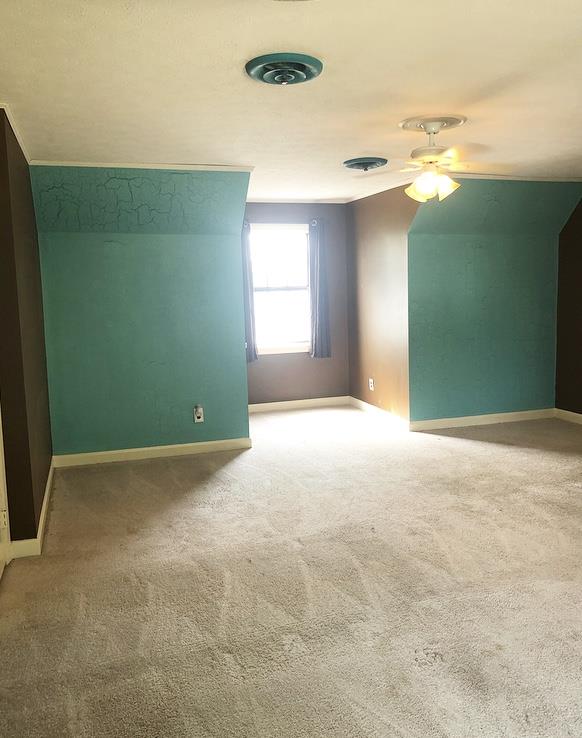 1607 Cairo Road Gallatin, TN 37066 - Photo 23 of 30 a view of a big room with windows and chandelier fan