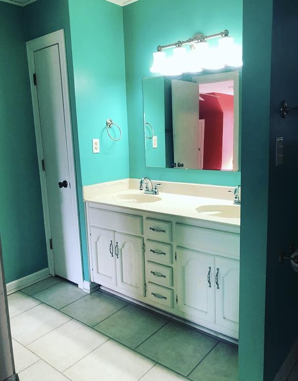 1607 Cairo Road Gallatin, TN 37066 - Photo 24 of 30 a bathroom with a sink vanity and a mirror