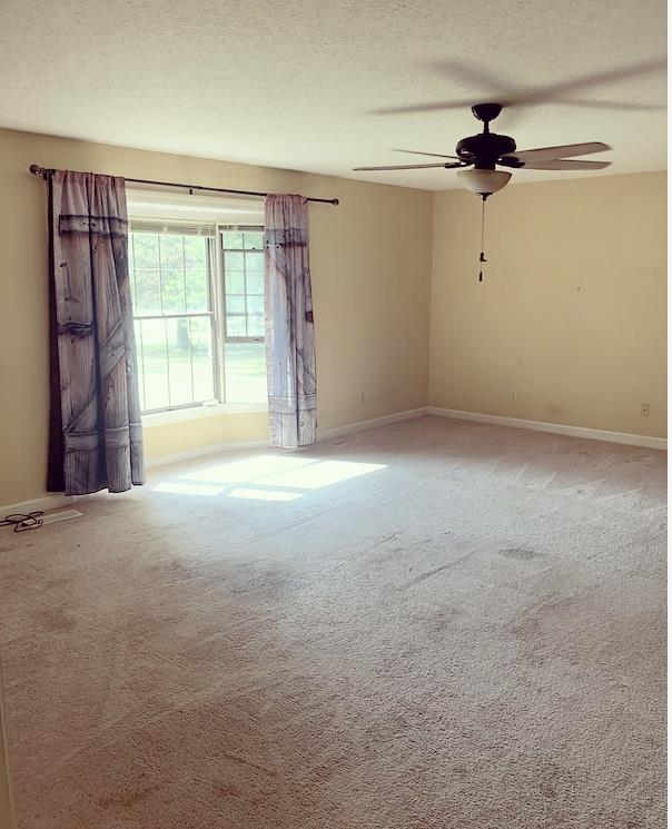 1607 Cairo Road Gallatin, TN 37066 - Photo 26 of 30 a view of a room with a ceiling fan and a window