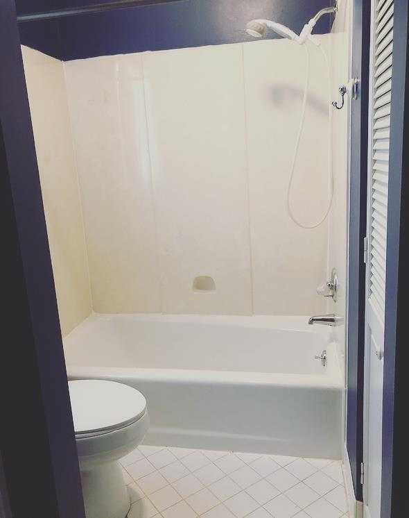 1607 Cairo Road Gallatin, TN 37066 - Photo 30 of 30 a bathroom with a toilet and a bathtub