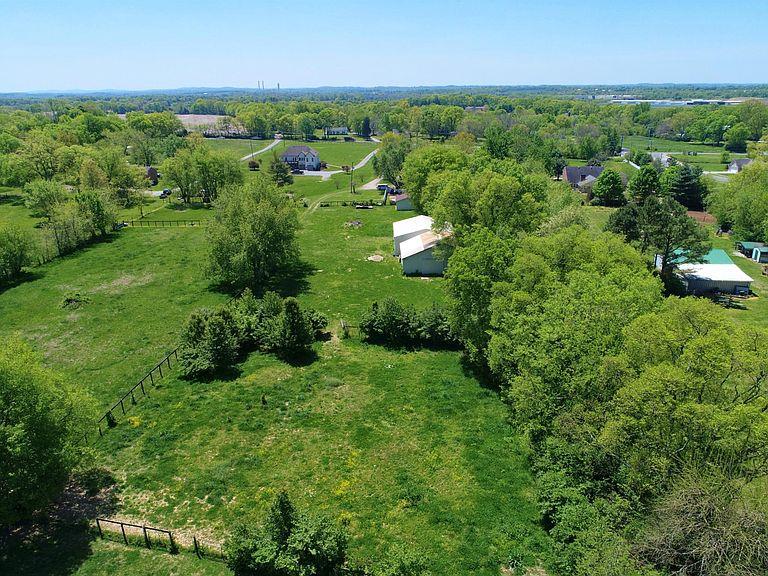 1607 Cairo Road Gallatin, TN 37066 - Photo 7 of 30 an aerial view of residential houses with outdoor space and trees